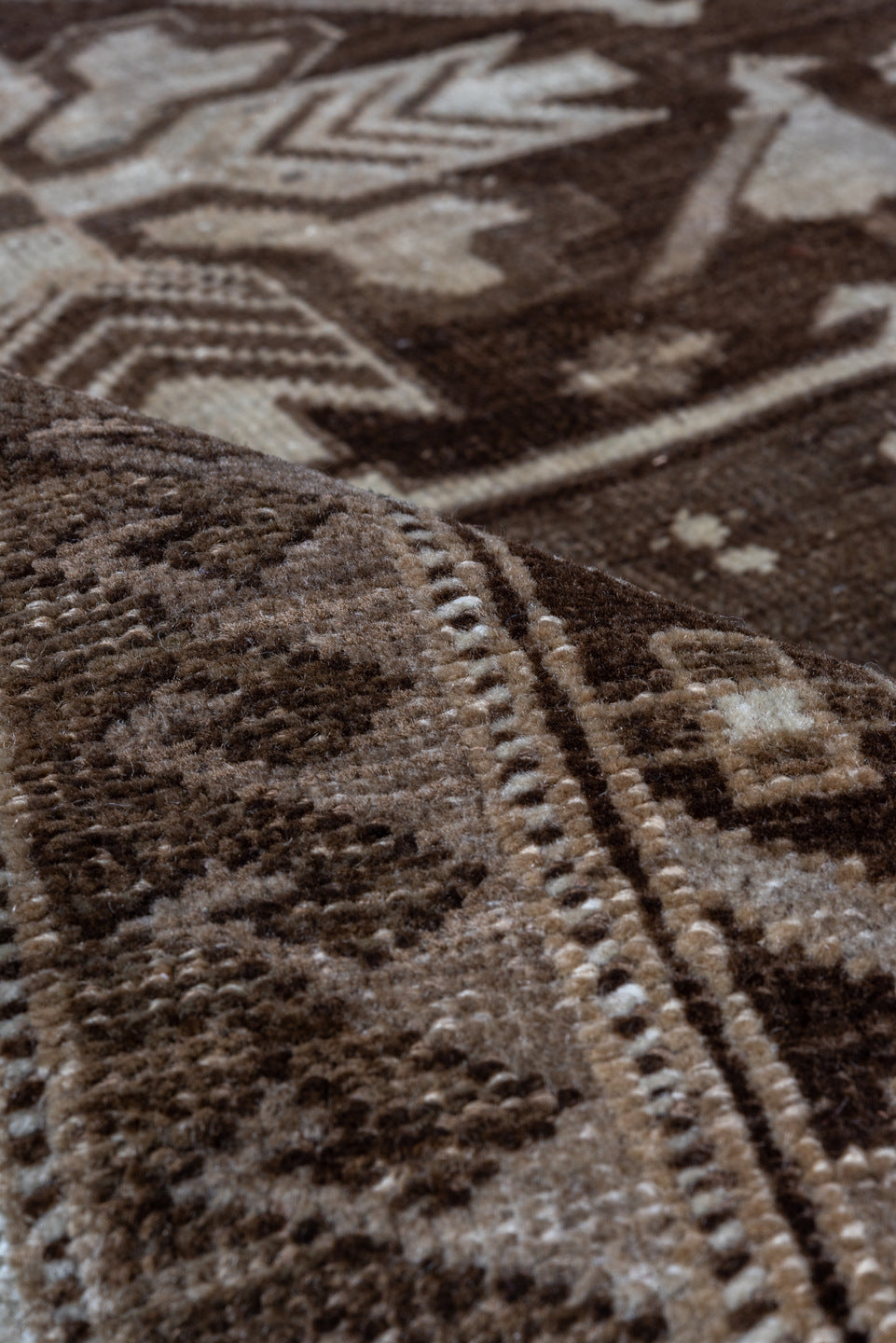 5' x 7' one-of-a-kind handmade vintage Kars rug. Color palette: brown, gray, pink