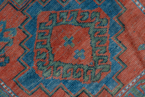 Rust, red and blue handmade vintage Caucasian area rug