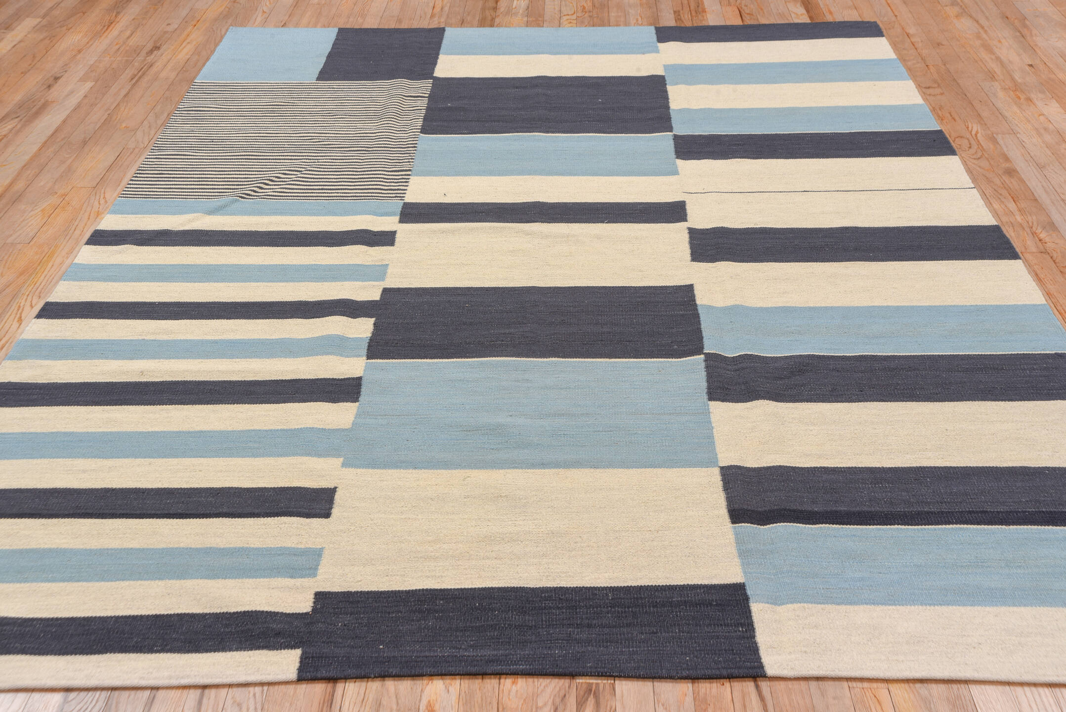7' x 9' one-of-a-kind handmade vintage Kilim rug. Color palette: black, blue, brown, charcoal, dark gray, gray, light blue