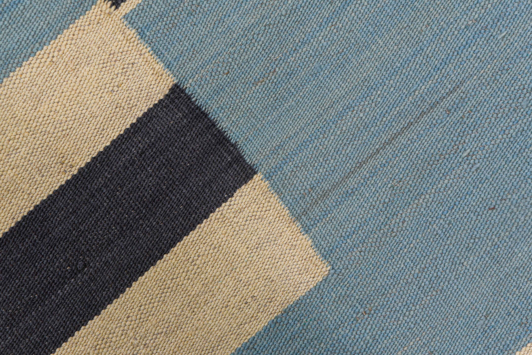 7' x 9' one-of-a-kind handmade vintage Kilim rug. Color palette: black, blue, brown, charcoal, dark gray, gray, light blue