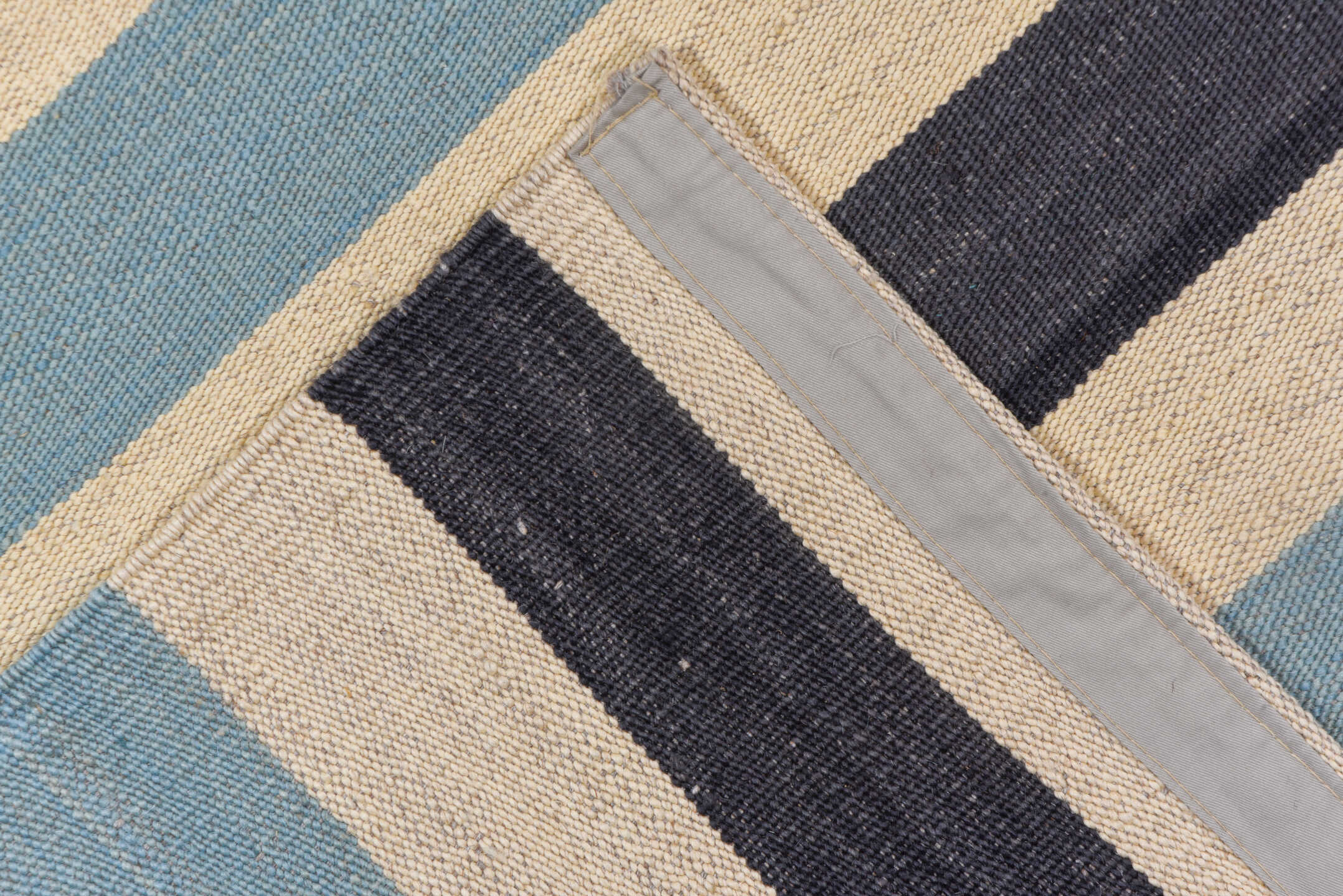 7' x 9' one-of-a-kind handmade vintage Kilim rug. Color palette: black, blue, brown, charcoal, dark gray, gray, light blue