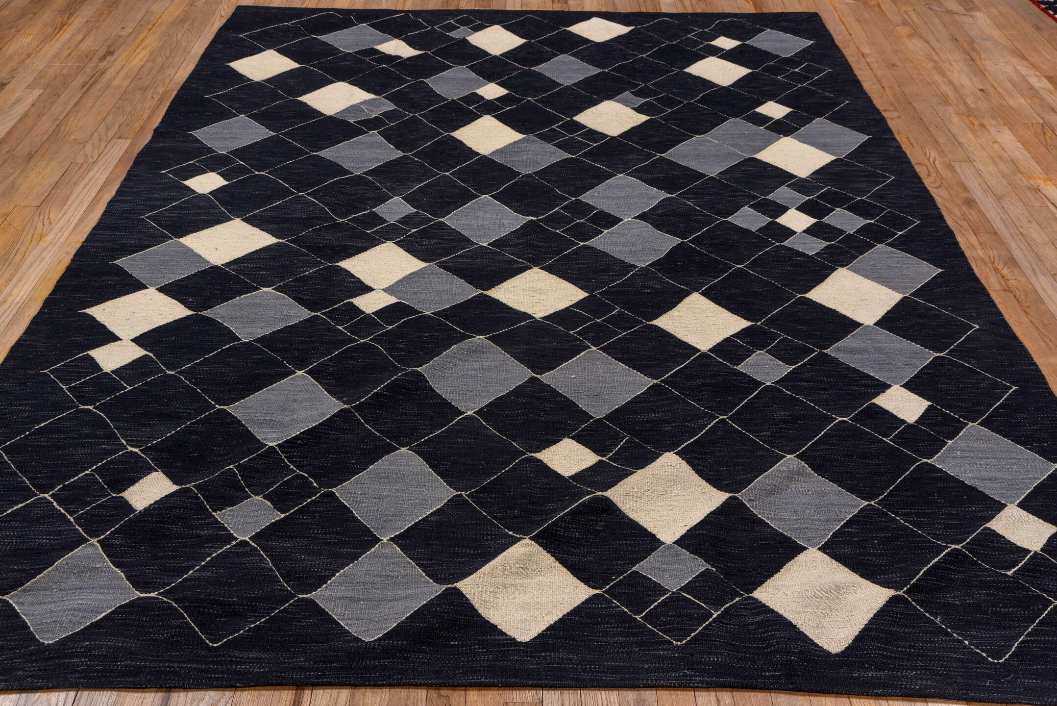 7' x 9' one-of-a-kind handmade vintage Kilim rug. Color palette: black, blue, brown, gray, light gray, off-white