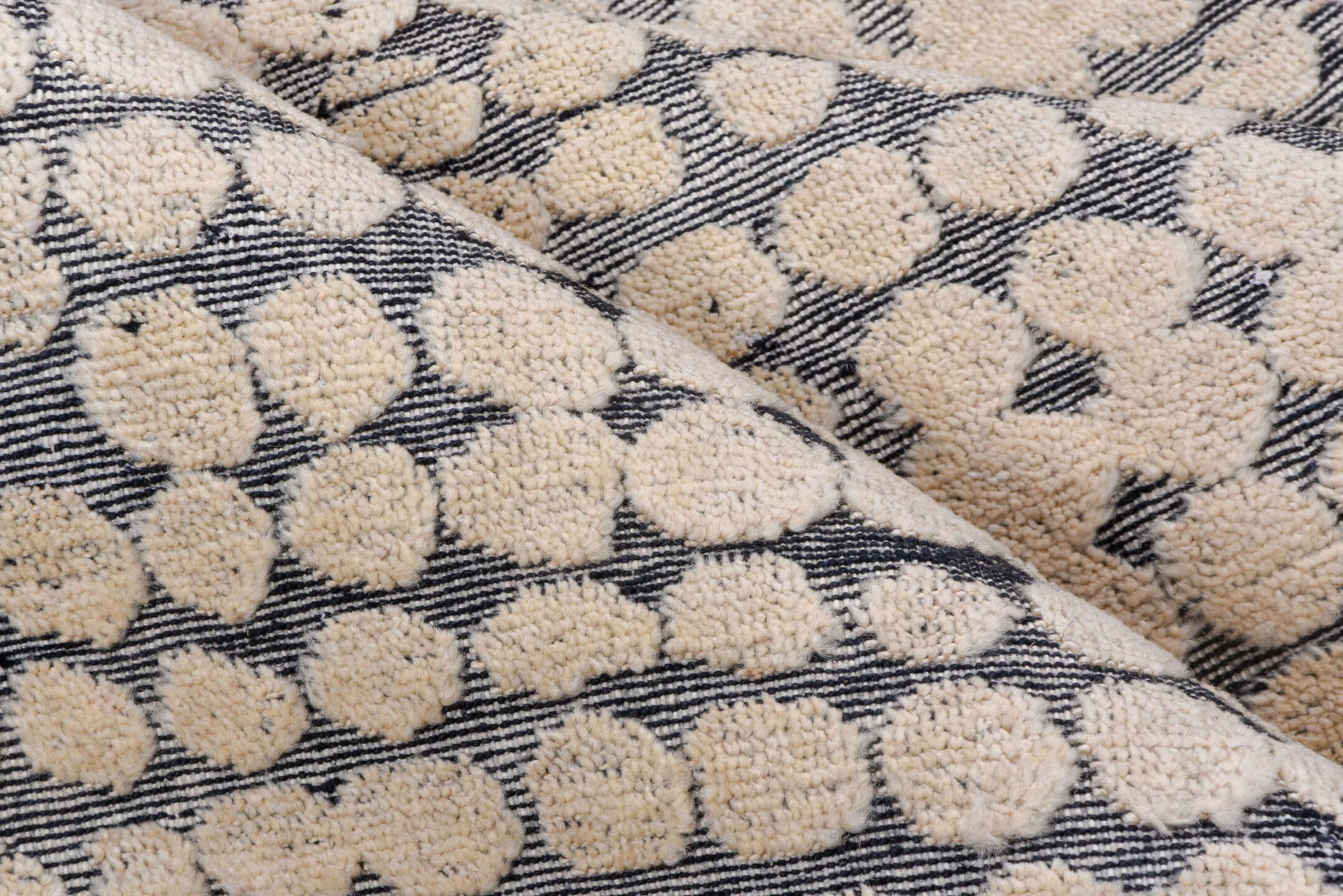 5' x 8' one-of-a-kind handmade handmade Modern medium size rug. Color palette: ivory, slate, gray, charcoal, black