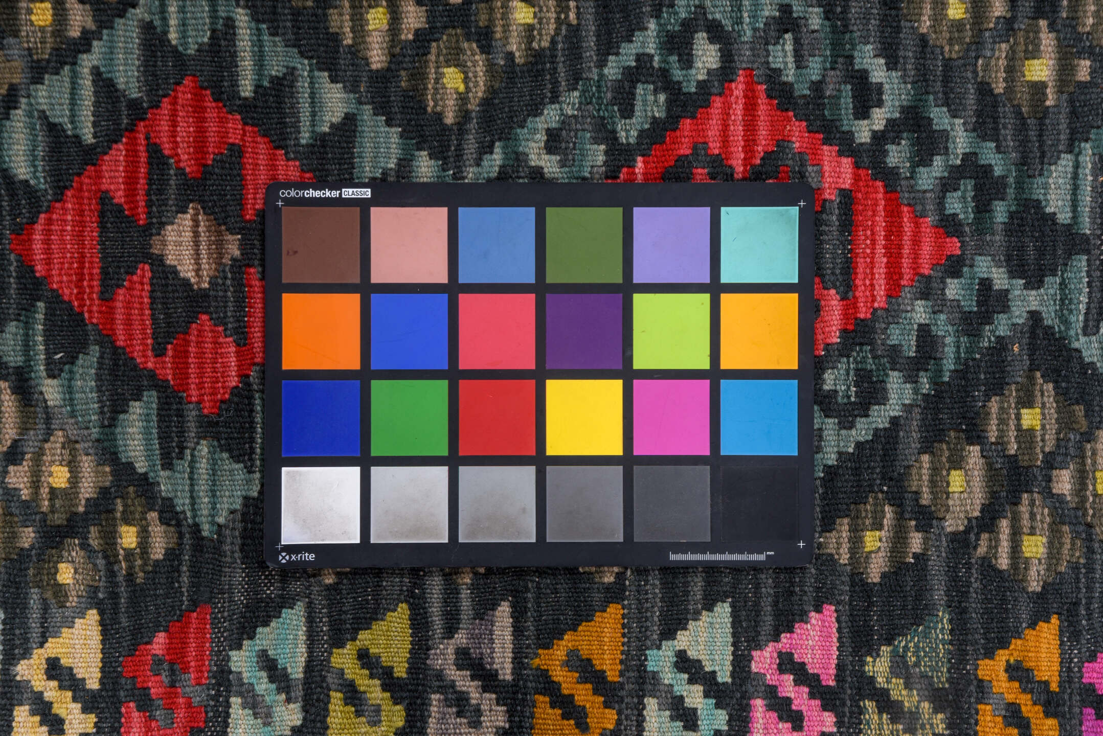 2' x 8' one-of-a-kind handmade vintage Kilim runner rug. Color palette: black, blue, brown, burgundy, gray, pink, red