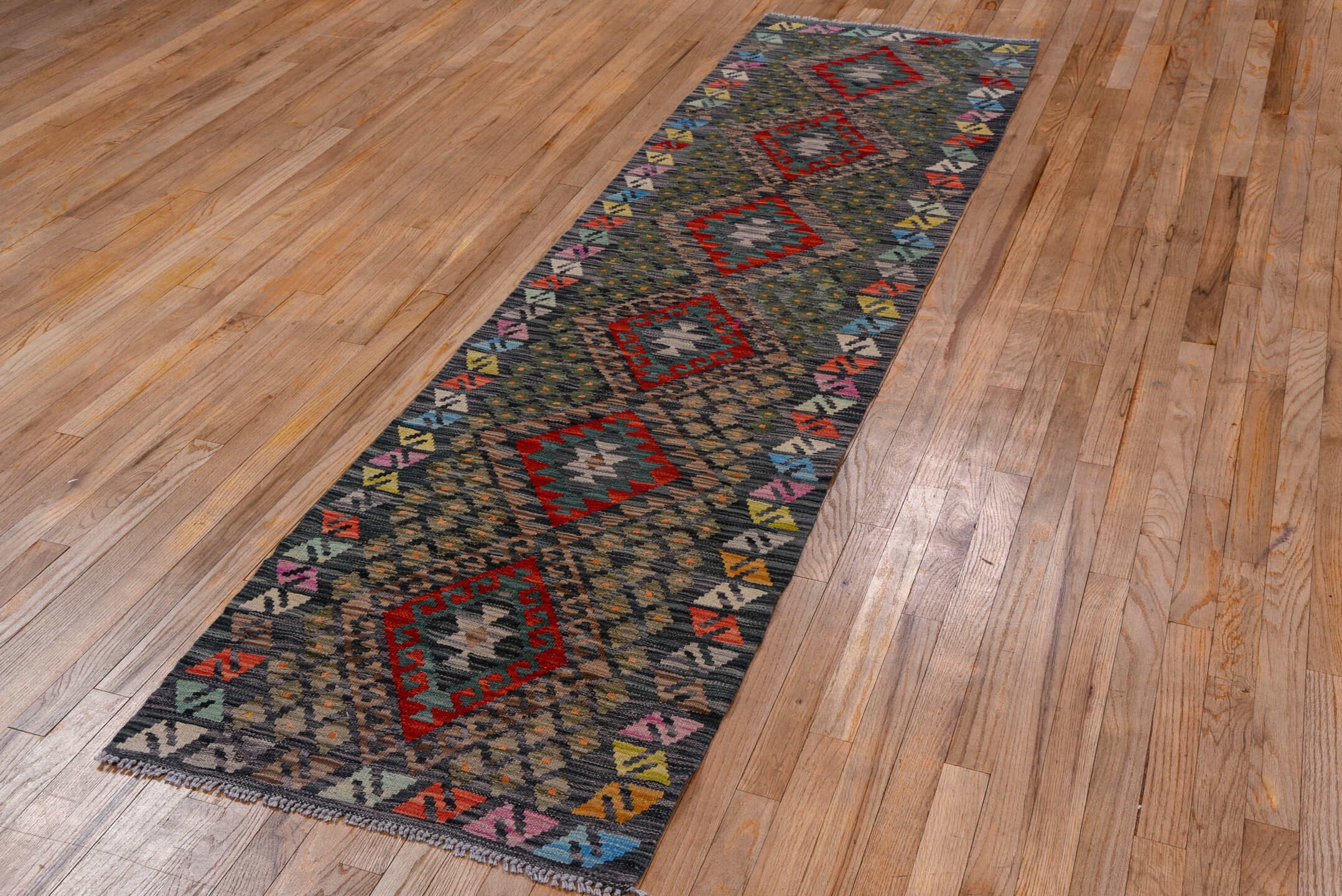 2' x 9' one-of-a-kind handmade vintage Kilim runner rug. Color palette: charcoal, crimson, taupe, sky_blue, ivory, blush