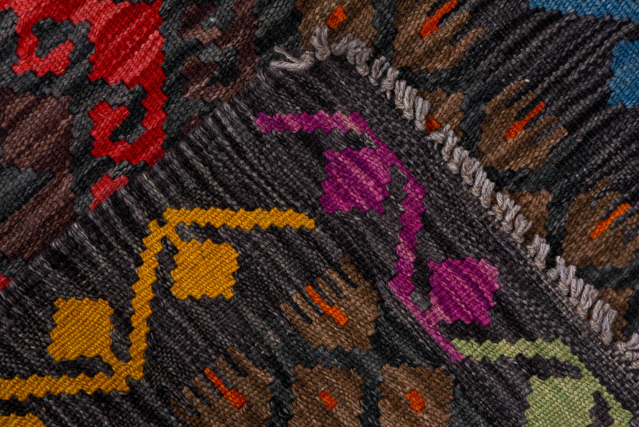 2' x 9' one-of-a-kind handmade vintage Kilim runner rug. Color palette: black, blue, brown, gray, pink, red, yellow