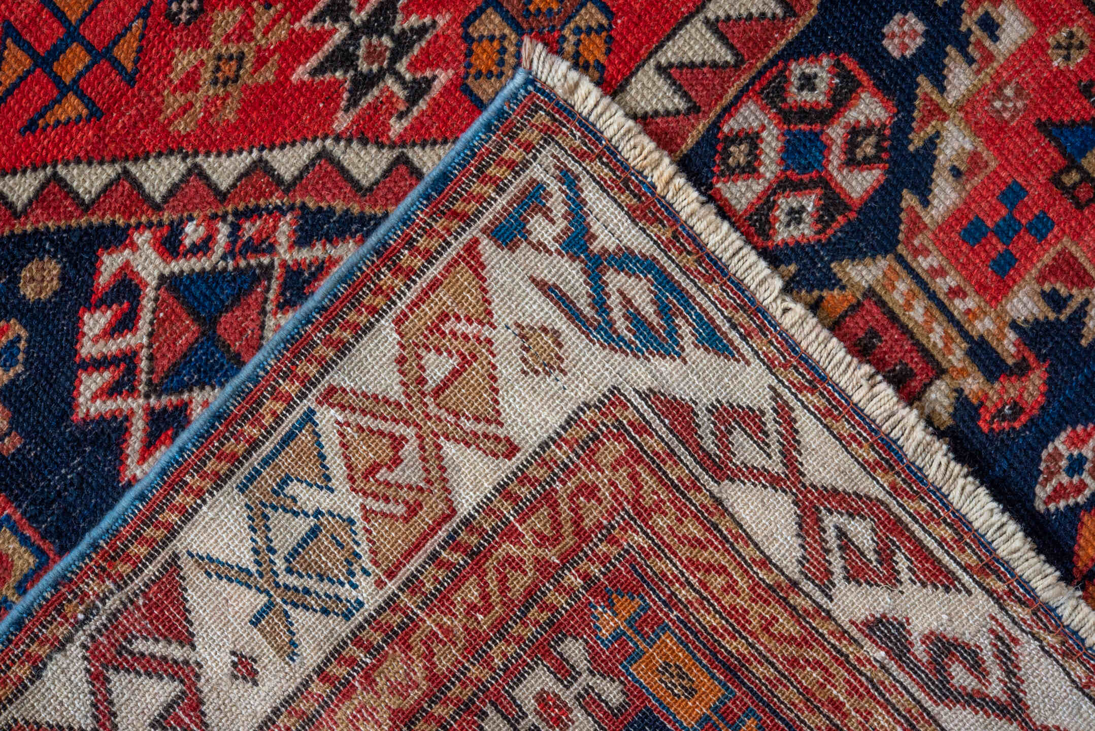 3' x 6' one-of-a-kind handmade antique Shirvan runner rug. Color palette: navy, rust, ivory, camel, crimson, terra cotta