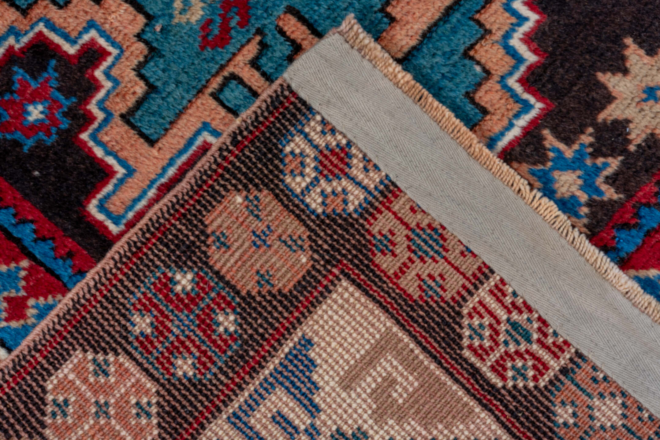 3' x 5' one-of-a-kind handmade vintage Caucasian small size rug. Color palette: black, blue, brown, fiord, gray, off-white