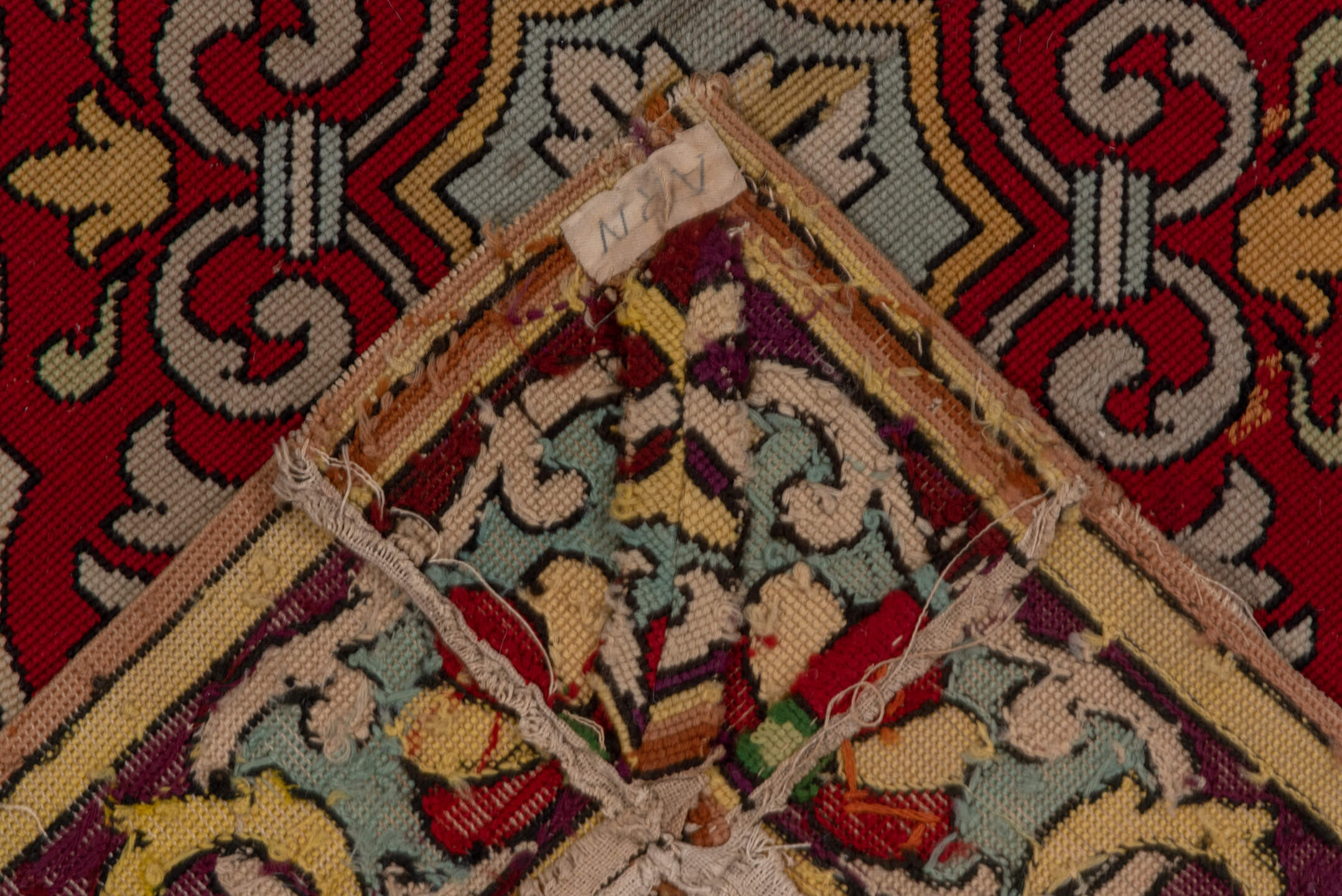 6' x 6' one-of-a-kind handmade vintage Needlepoint rug. Color palette: brown, gray, red