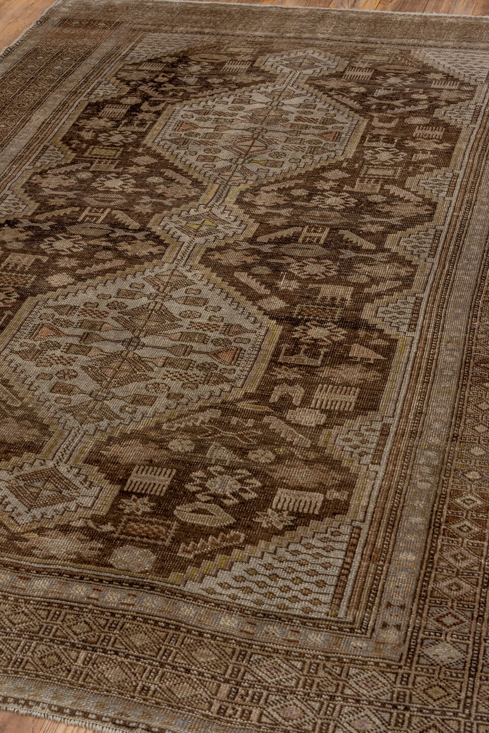 4' x 6' one-of-a-kind handmade vintage Caucasian small size rug. Color palette: brown, gray