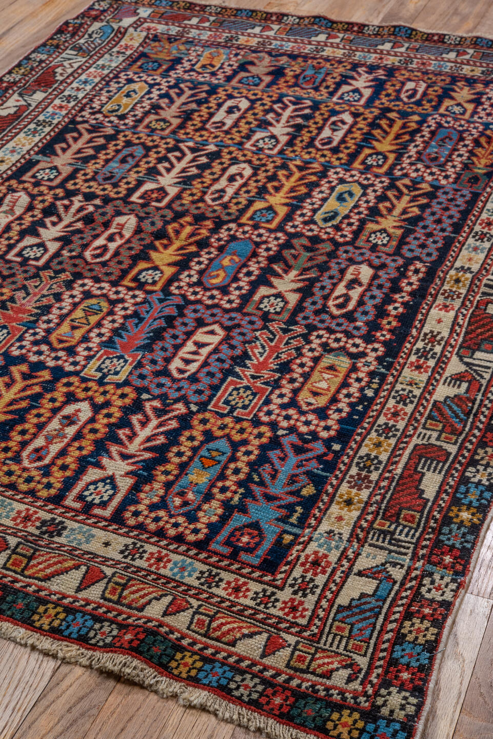 3' x 4' one-of-a-kind handmade vintage Shirvan small size rug. Color palette: black, blue, brown, gray, red