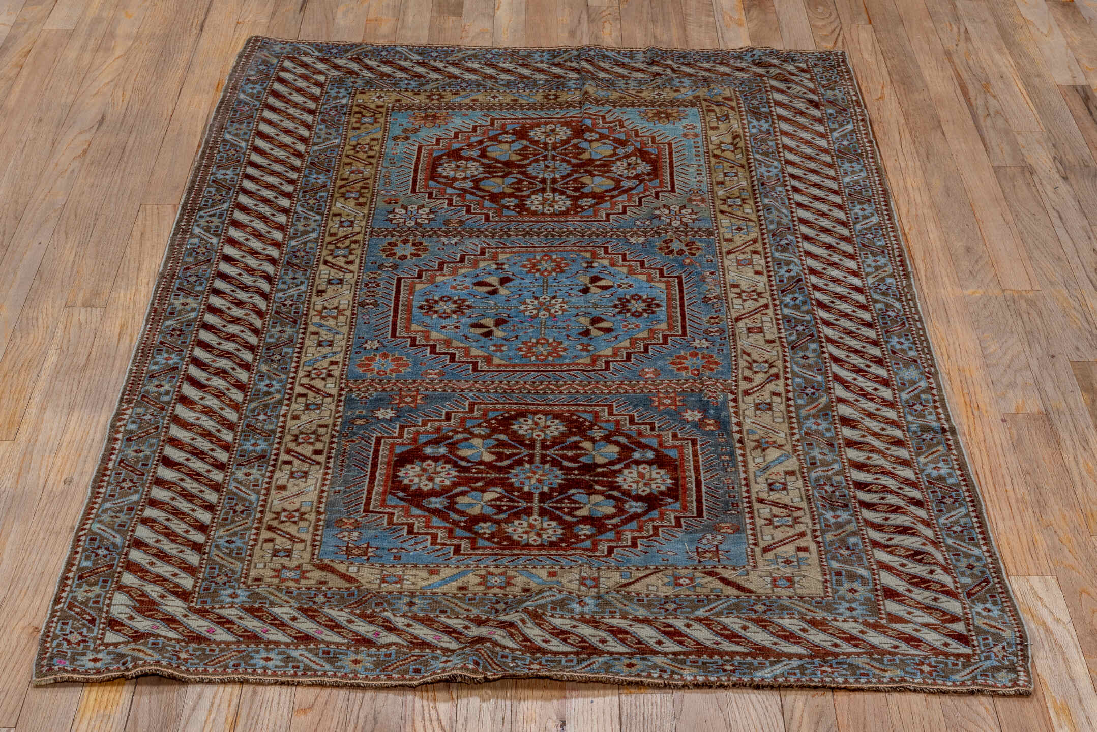 3' x 5' one-of-a-kind handmade antique Shirvan small size rug. Color palette: sky blue, rust, brown, ivory, slate, camel