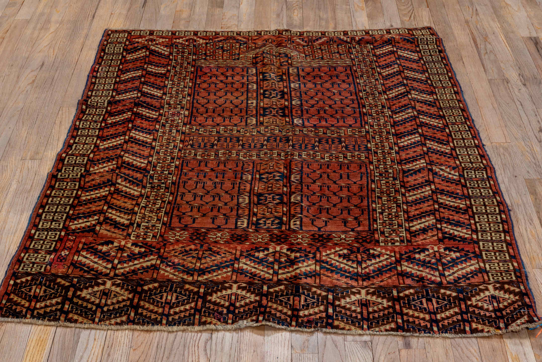 4' x 4' one-of-a-kind handmade antique Torkaman small size rug. Color palette: rust, burgundy, ivory, camel, charcoal