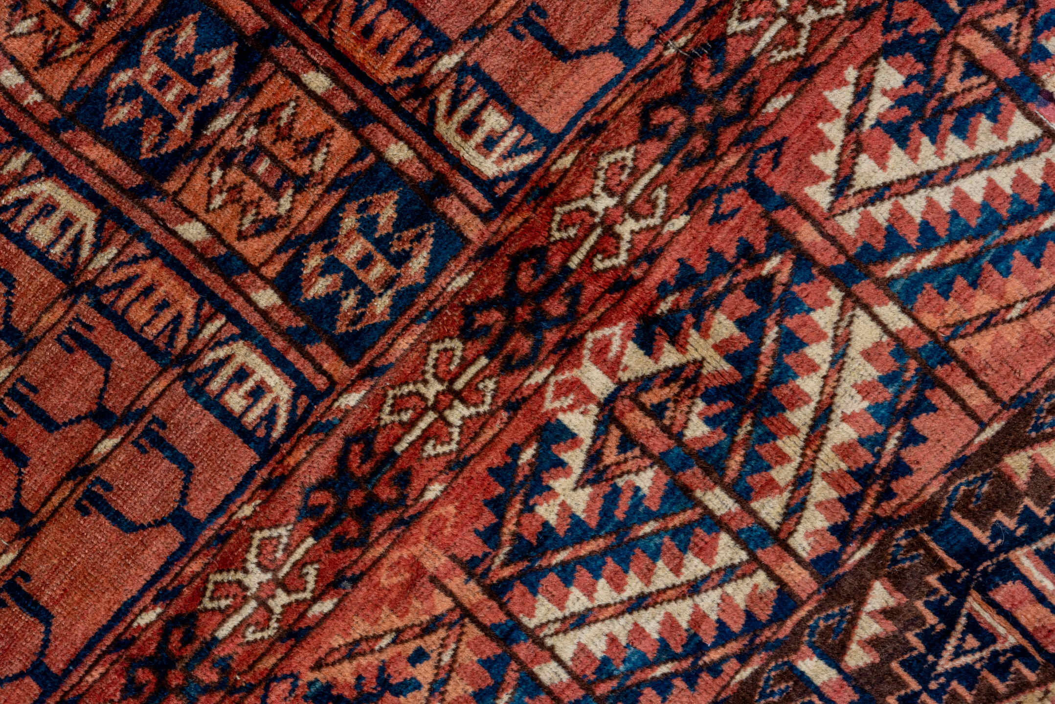 4' x 4' one-of-a-kind handmade antique Torkaman small size rug. Color palette: rust, burgundy, ivory, camel, charcoal