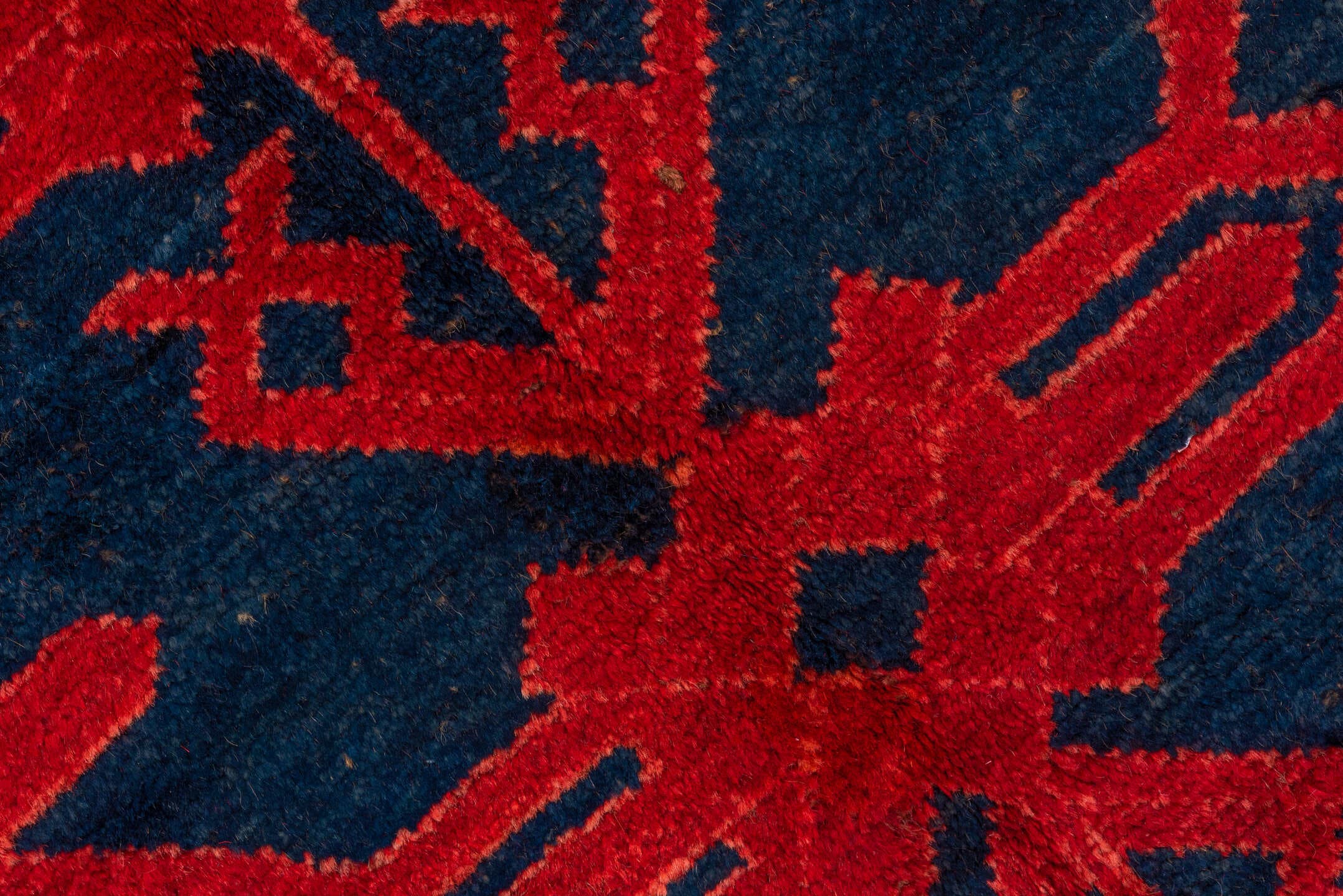4' x 10' one-of-a-kind handmade antique Khotan runner rug. Color palette: crimson, navy, burgundy, indigo, red, blue, purple