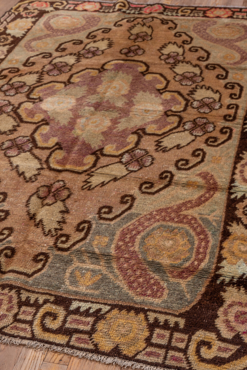 4' x 6' one-of-a-kind handmade antique Khotan small size rug. Color palette: camel, brown, ivory, rose, pale blue, gold