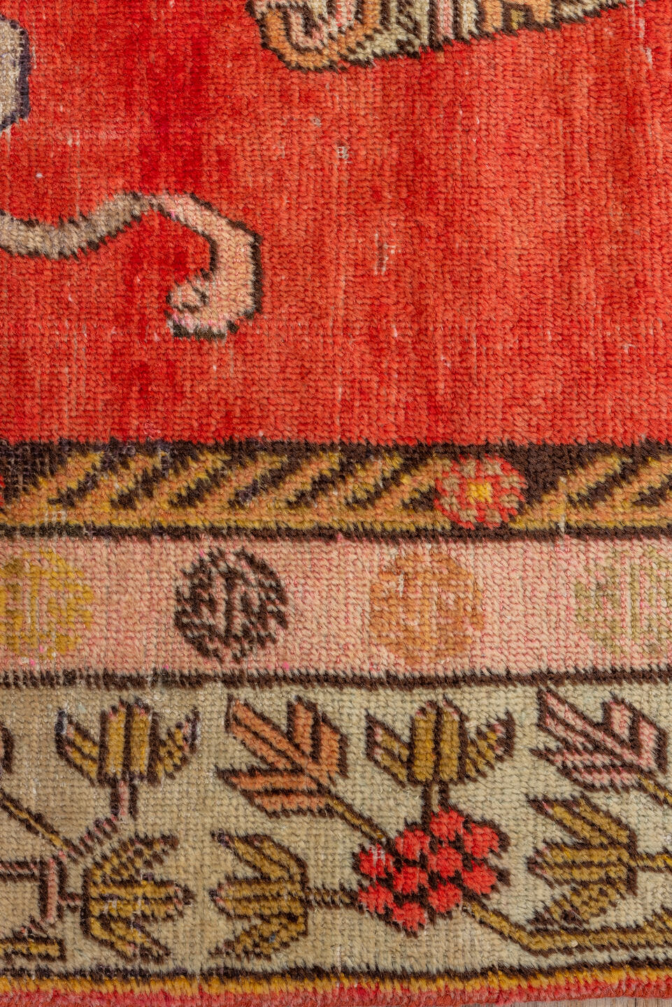 4' x 8' one-of-a-kind handmade antique Khotan rug. Color palette: red, ivory, camel, charcoal, coral, gold, taupe, rose