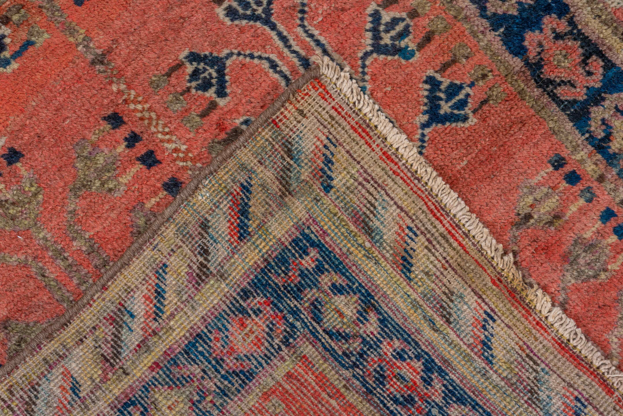 2' x 4' one-of-a-kind handmade antique Khotan small size rug. Color palette: coral, navy, camel, ivory, terra cotta, slate