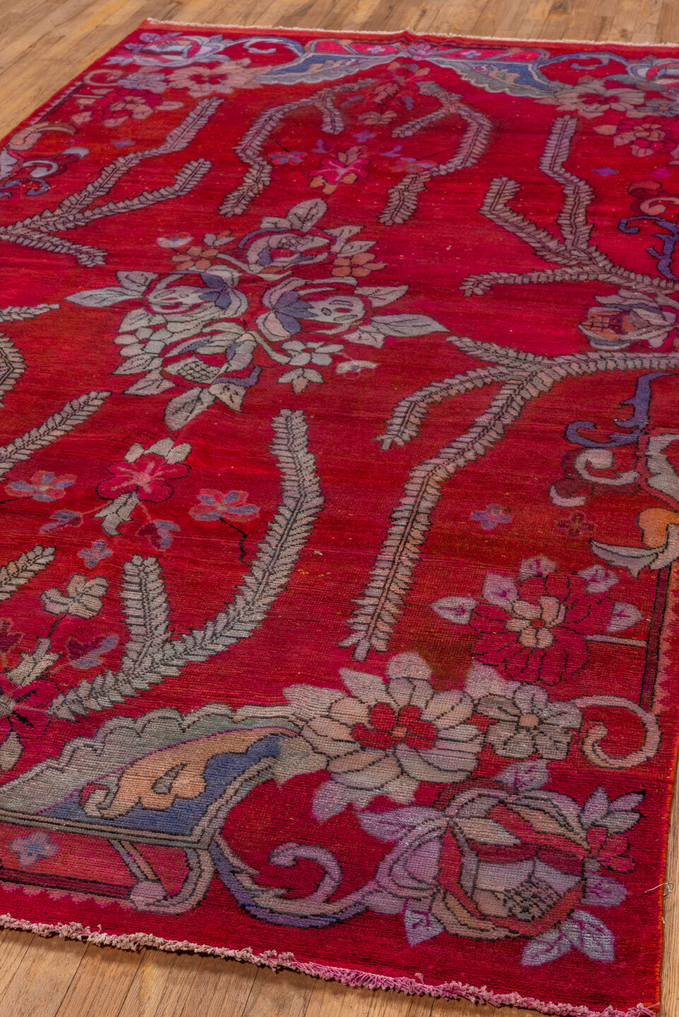 5' x 10' one-of-a-kind handmade vintage Khotan medium size rug. Color palette: blue, brown, gray, pink, red