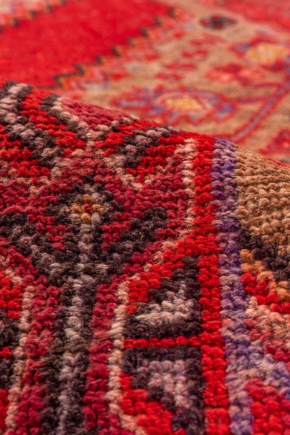 5' x 12' one-of-a-kind handmade antique Khotan rug. Color palette: red, crimson, rose, lavender, ivory, taupe, charcoal