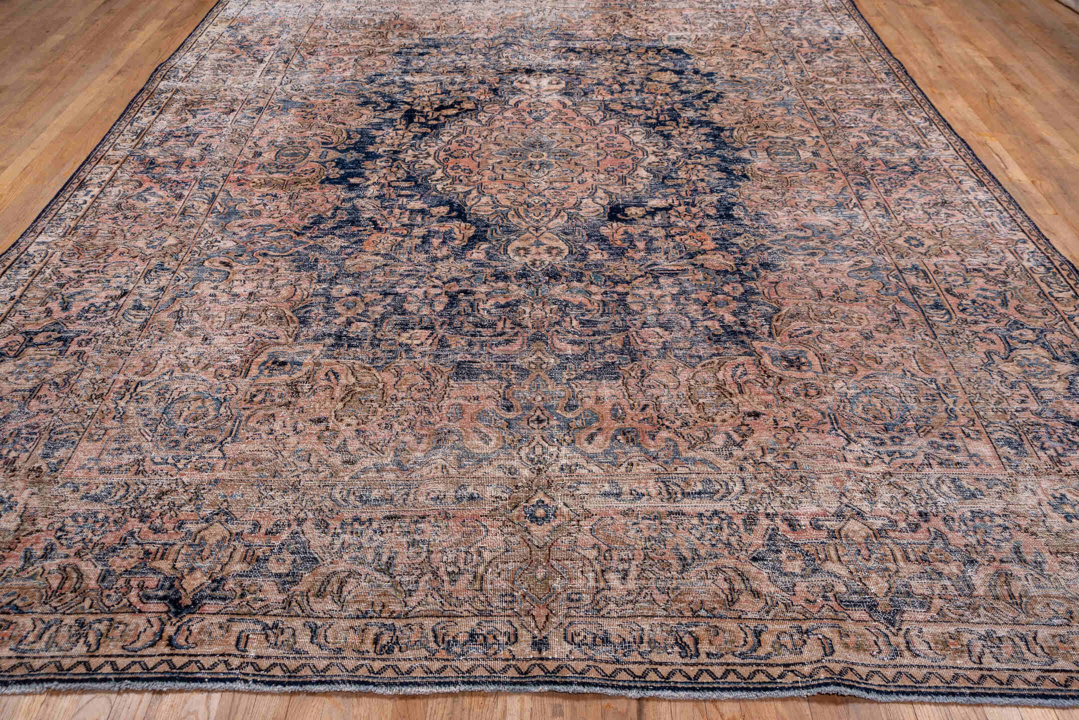 9' x 12' one-of-a-kind handmade vintage Distressed large size rug. Color palette: black, blue, brown, gray, light gray