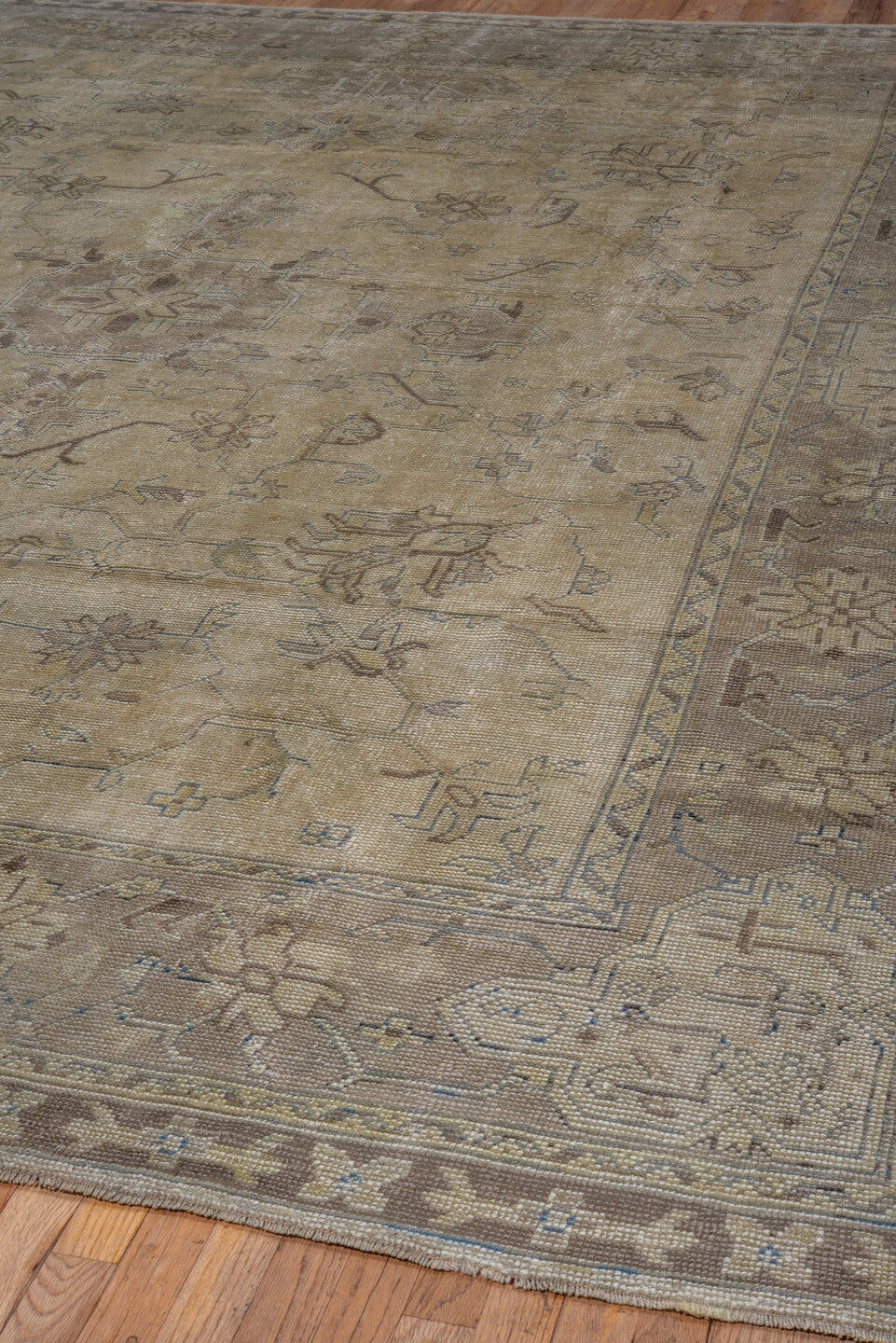 9' x 12' one-of-a-kind handmade antique Oushak large size rug. Color palette: ivory, taupe, beige, brown, pale blue, camel