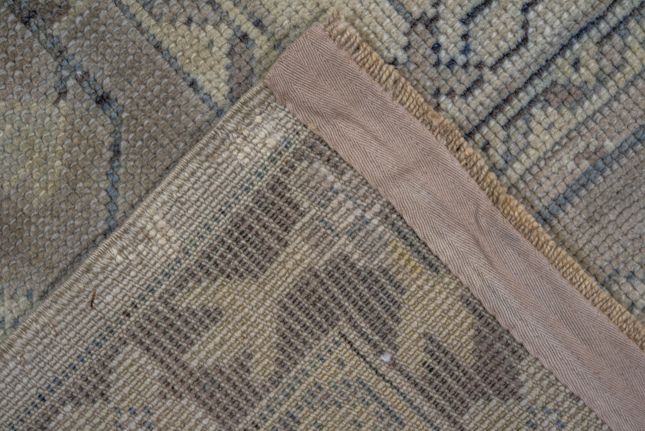 9' x 12' one-of-a-kind handmade antique Oushak large size rug. Color palette: ivory, taupe, beige, brown, pale blue, camel