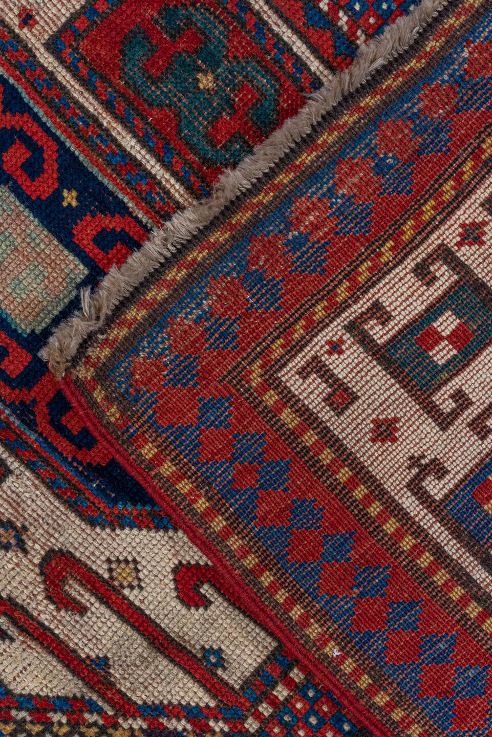 4' x 4' one-of-a-kind handmade antique Kazak small size rug. Color palette: ivory, red, navy, cobalt, teal, crimson, camel