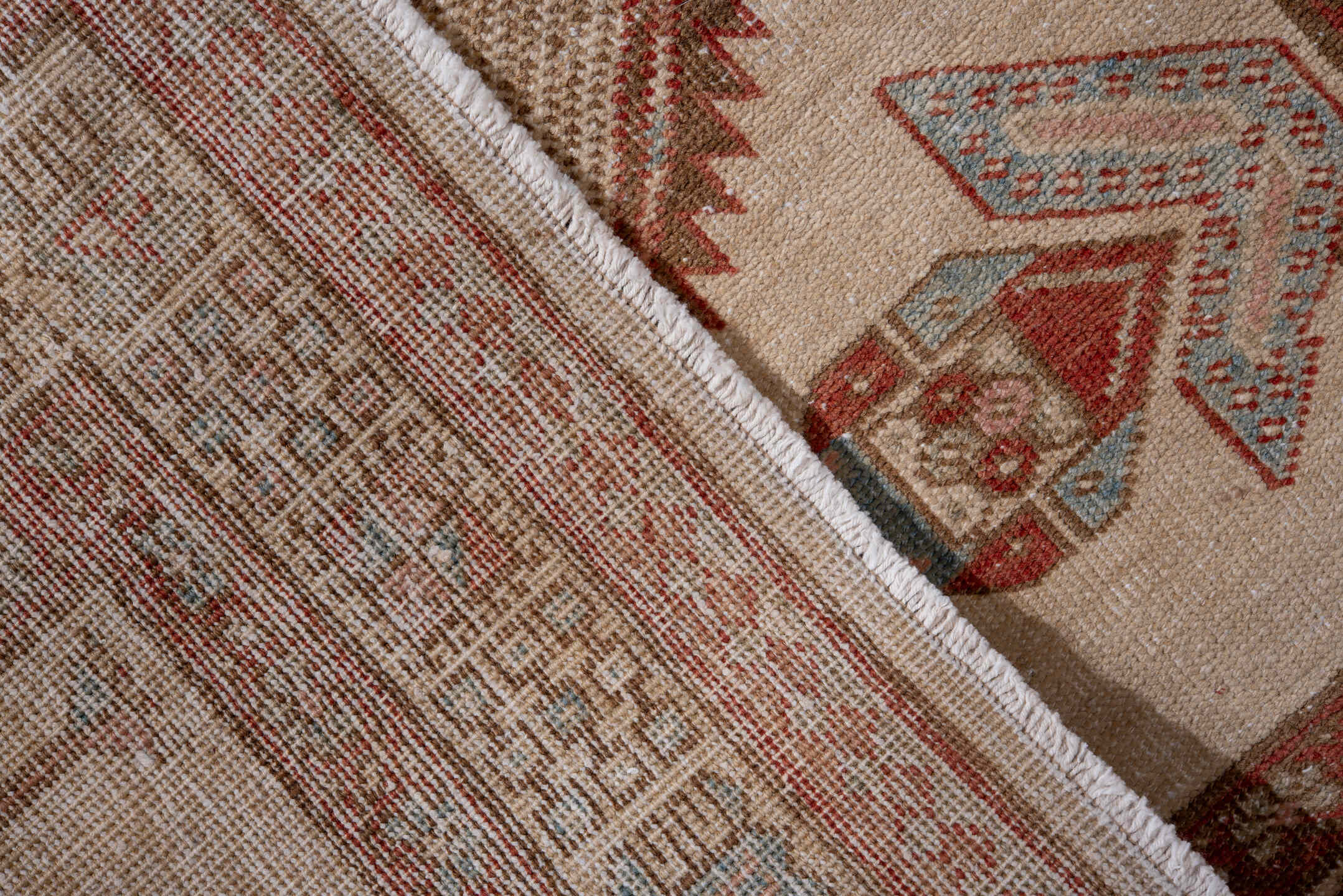 2' x 12' one-of-a-kind handmade antique Sarab runner rug. Color palette: ivory, rust, sky blue, camel, terra cotta, taupe