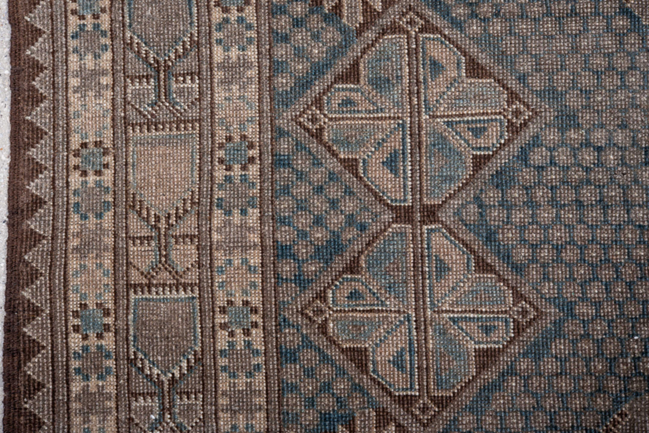 5' x 7' one-of-a-kind handmade vintage Belouch rug. Color palette: pink, gray, black, brown, light gray, blue, charcoal