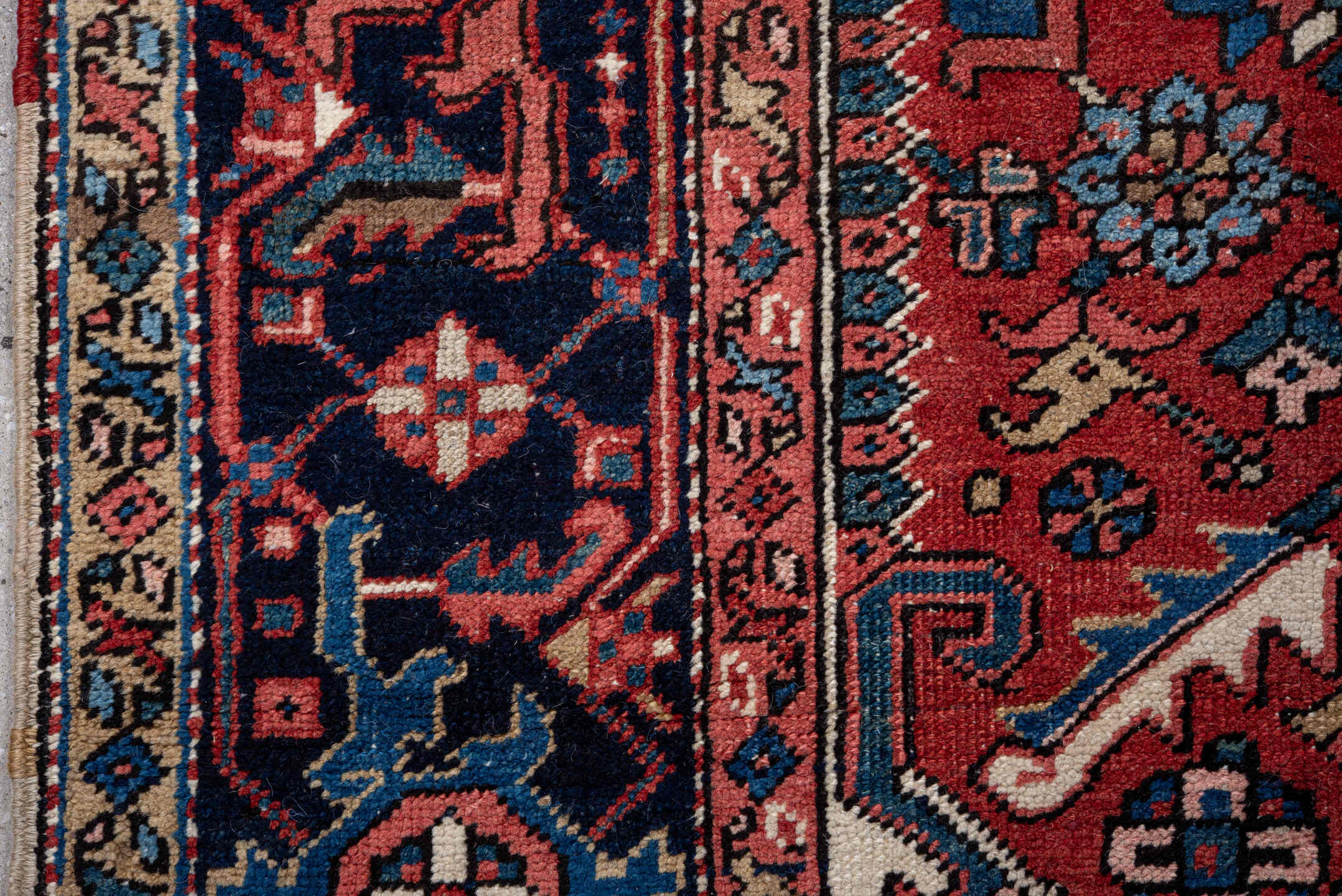7' x 10' one-of-a-kind handmade antique Heriz large size rug. Color palette: rust, navy, ivory, sky_blue, coral, camel