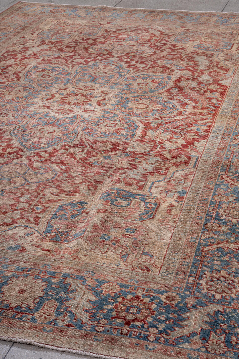 8' x 12' one-of-a-kind handmade antique Heriz large size rug. Color palette: rust, sky blue, ivory, beige, brick, camel
