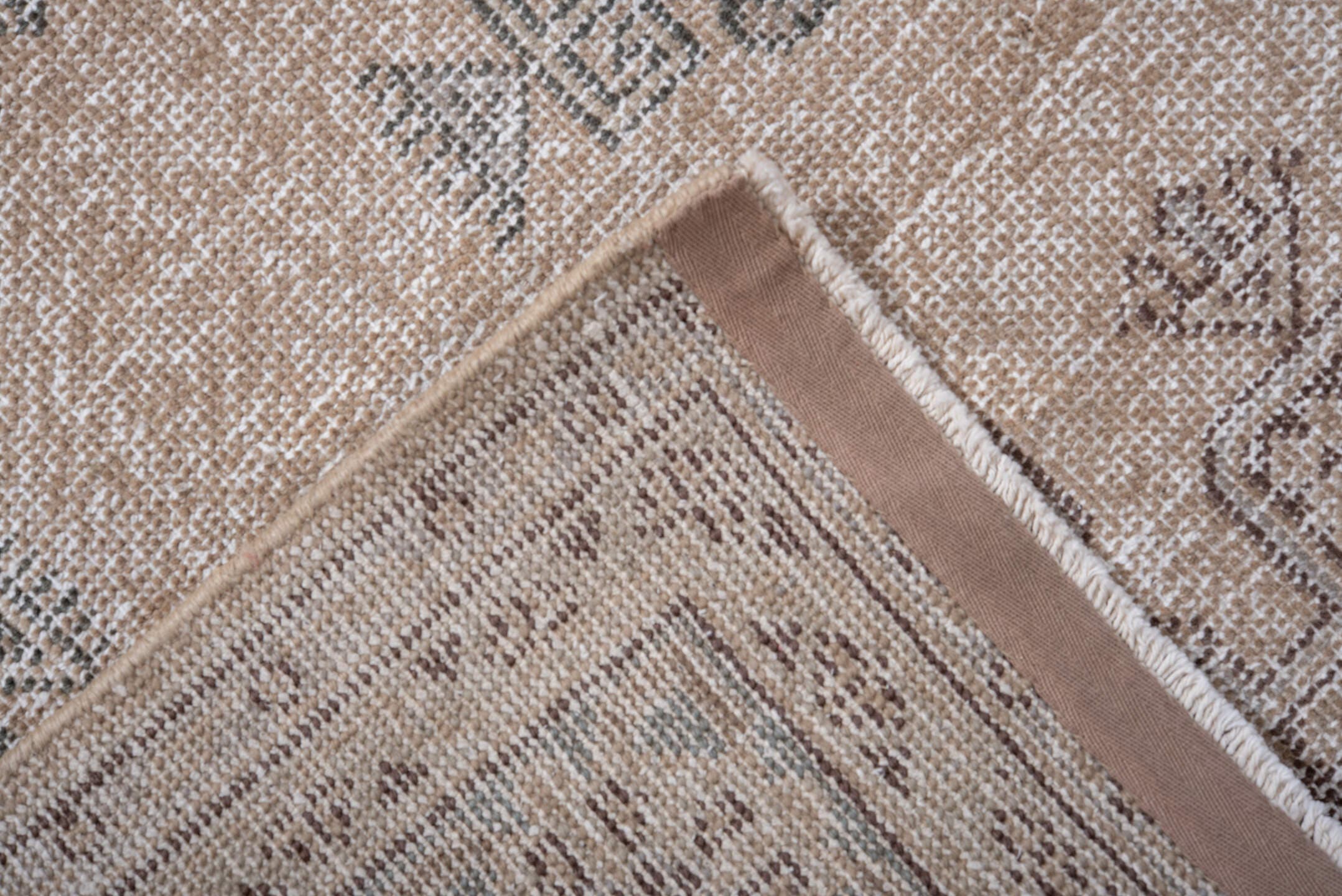 5' x 7' one-of-a-kind handmade antique Veece rug. Color palette: beige, ivory, taupe, slate, pale blue, brown, gray