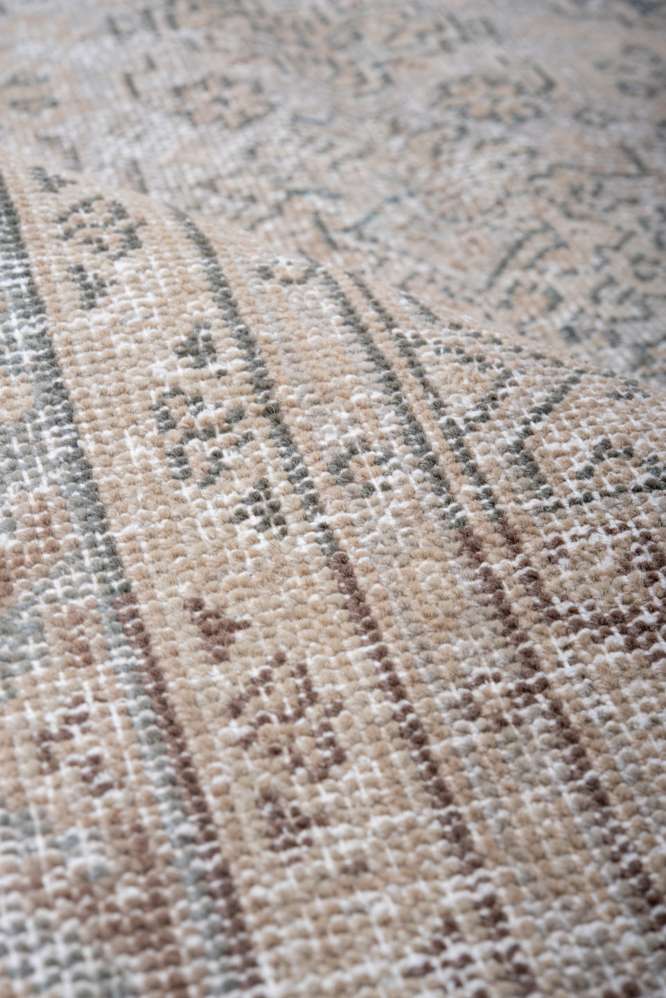 5' x 7' one-of-a-kind handmade antique Veece rug. Color palette: beige, ivory, taupe, slate, pale blue, brown, gray
