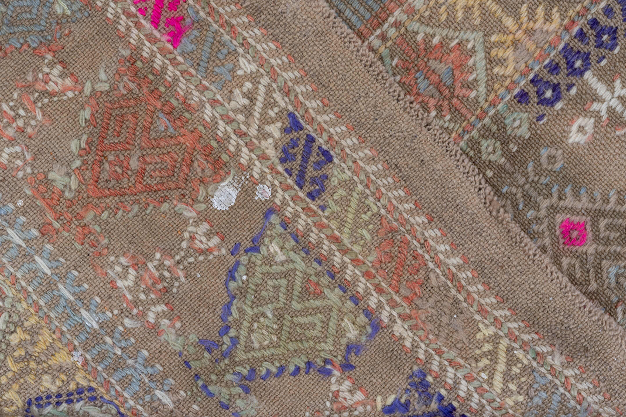 6' x 9' one-of-a-kind handmade antique Jijim medium size rug. Color palette: camel, taupe, rose, ivory, slate, violet, sand