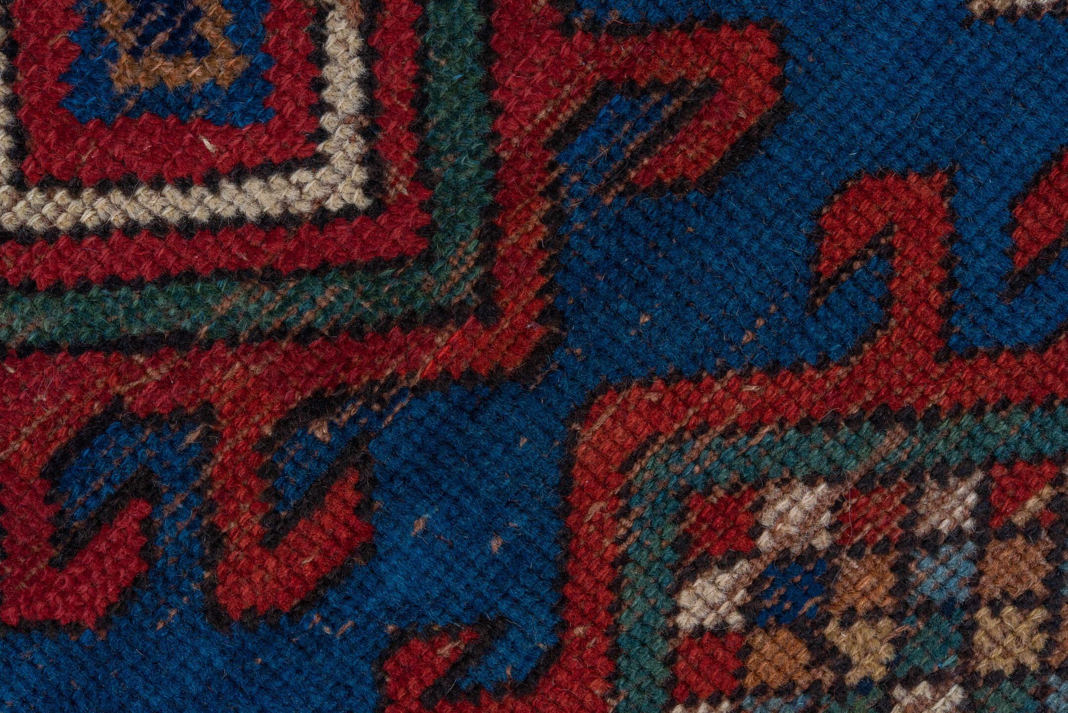 3' x 6' one-of-a-kind handmade vintage Kazak small size rug. Color palette: blue, brown, gray, pink, red