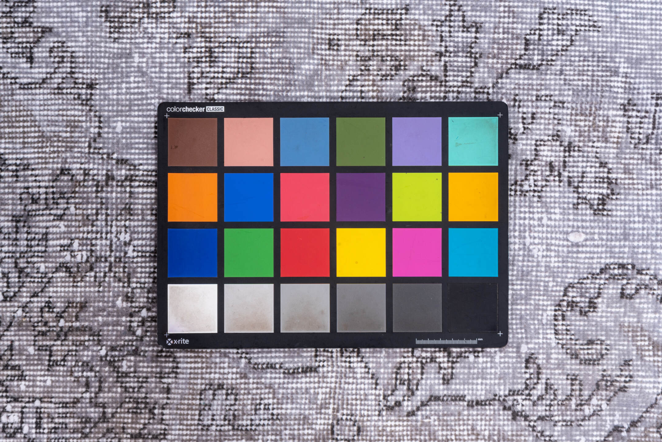 5' x 9' one-of-a-kind handmade vintage Sparta medium size rug. Color palette: dim gray, gray, light gray, off-white, pink