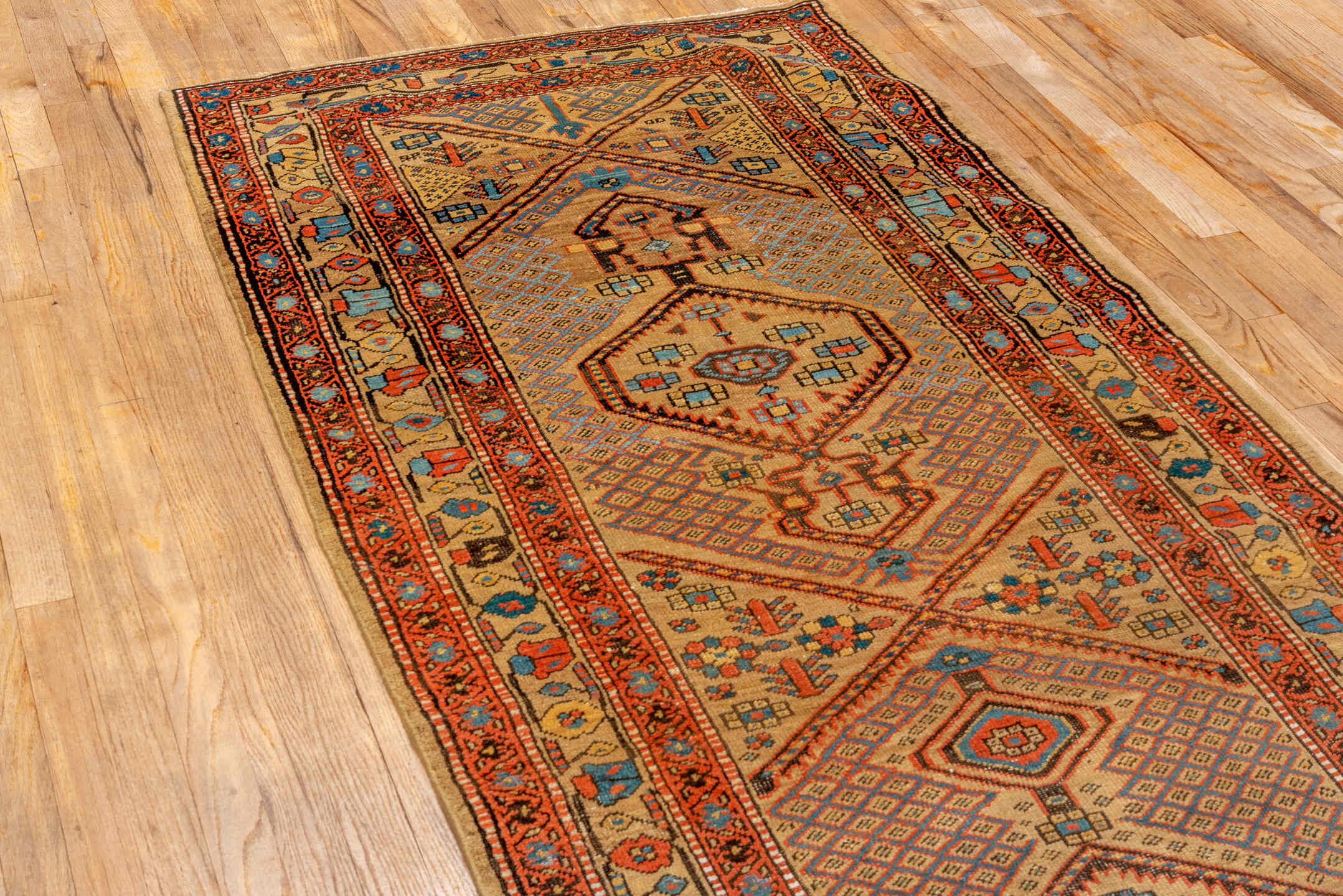 3' x 13' one-of-a-kind handmade antique Sarab runner rug. Color palette: ivory, rust, sky_blue, indigo, camel, terracotta
