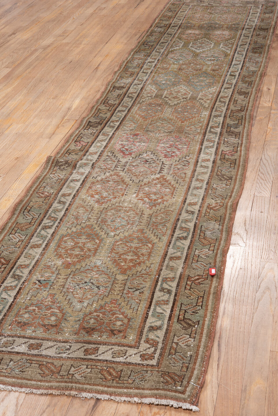 2' x 12' one-of-a-kind handmade antique NW Persian runner rug. Color palette: camel, ivory, taupe, rust, pale_blue, brown