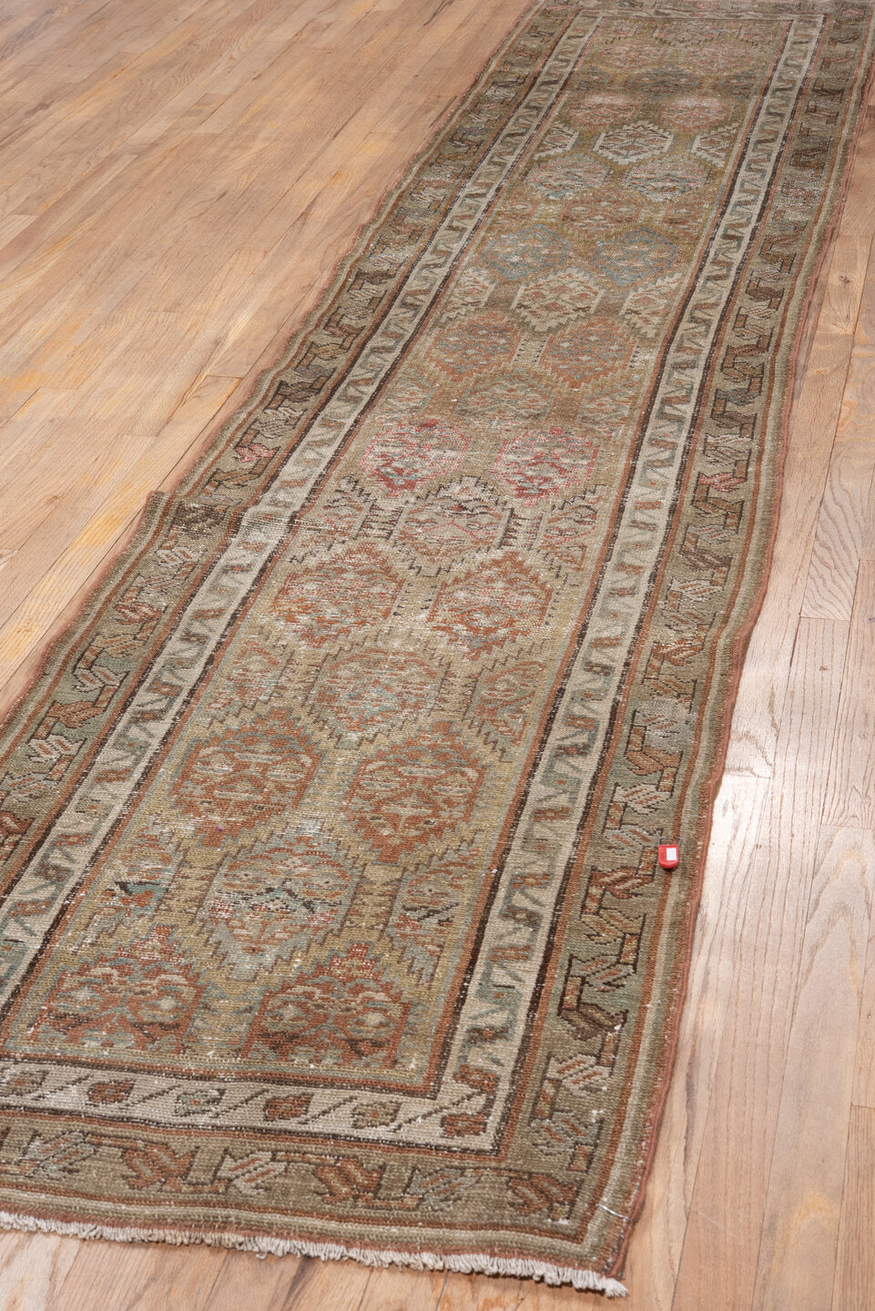 2' x 12' one-of-a-kind handmade antique NW Persian runner rug. Color palette: camel, ivory, taupe, rust, pale_blue, brown