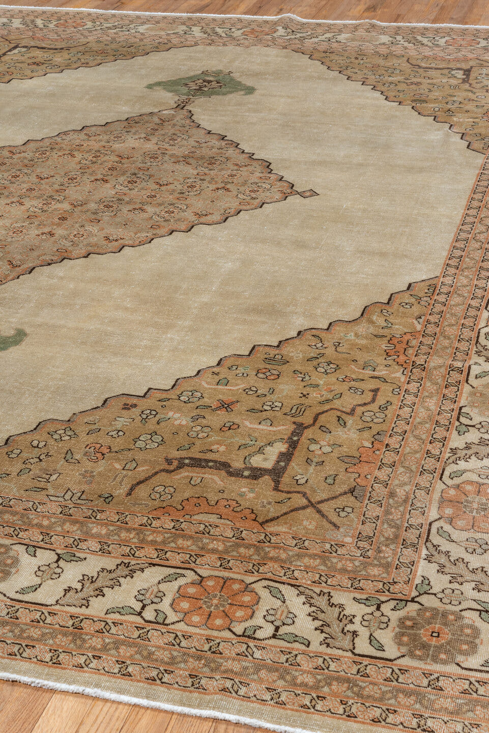 9' x 11' one-of-a-kind handmade antique Tabriz large size rug. Color palette: ivory, blush, taupe, sage, camel, brown, peach