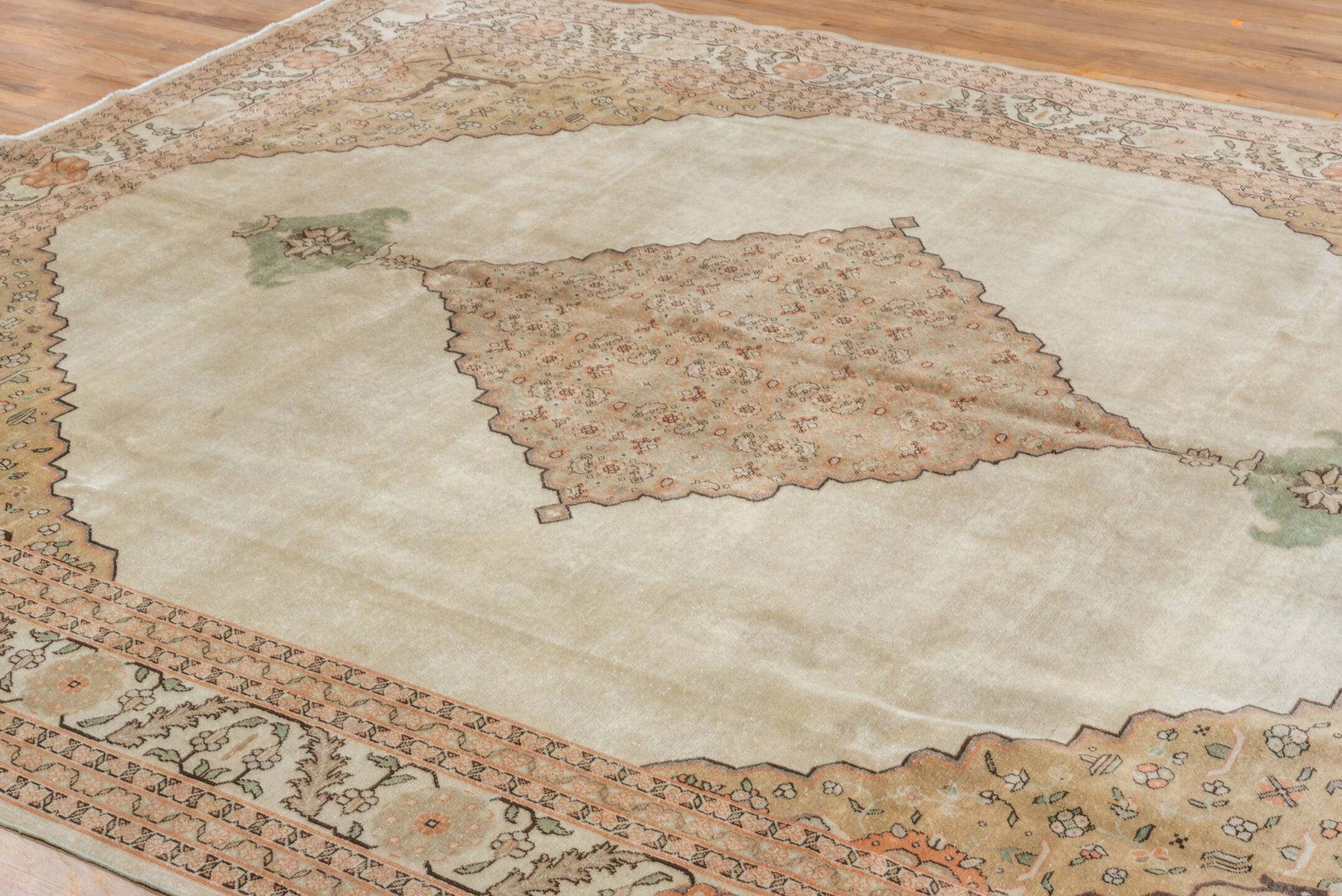 9' x 11' one-of-a-kind handmade antique Tabriz large size rug. Color palette: ivory, blush, taupe, sage, camel, brown, peach
