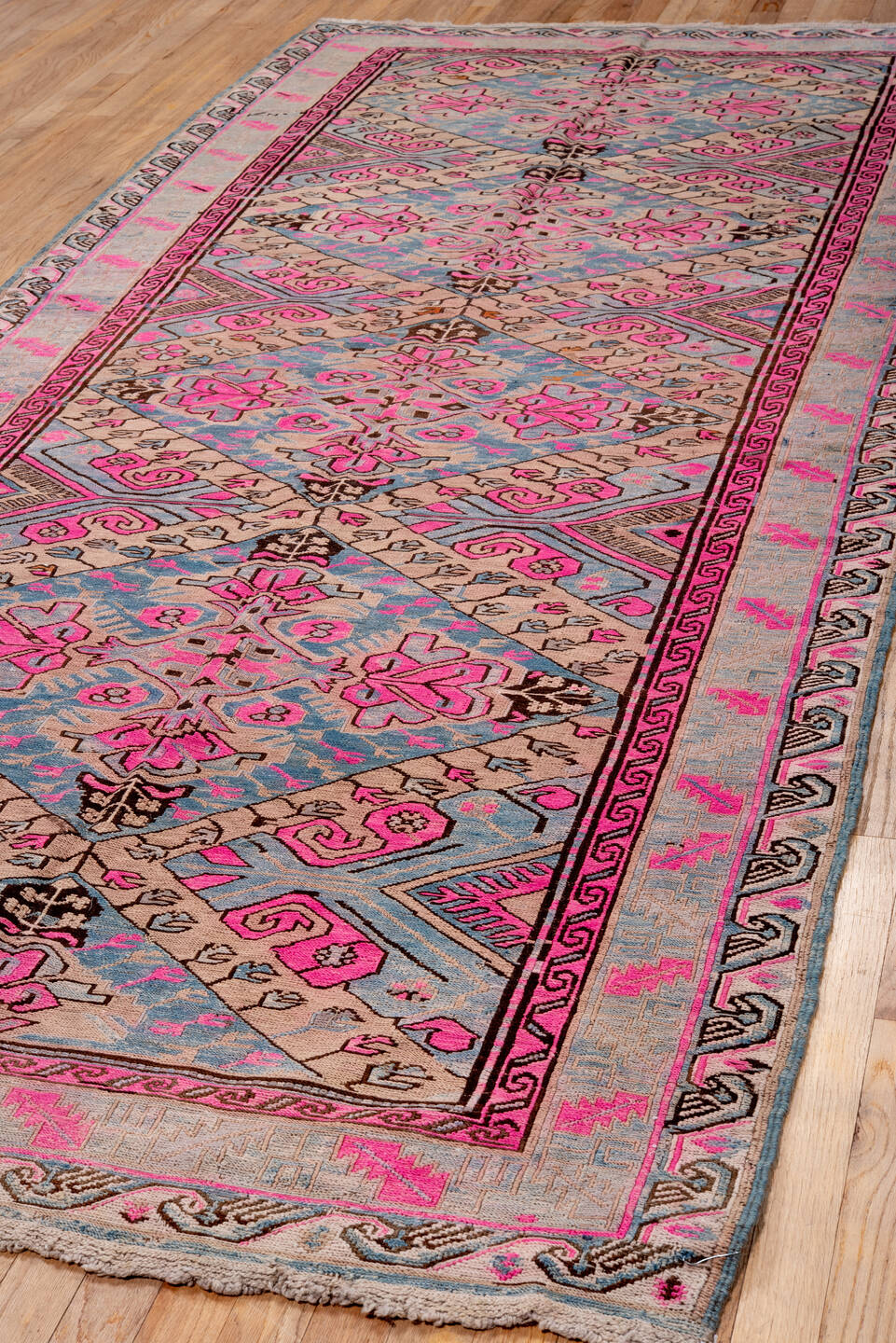 4' x 10' one-of-a-kind handmade antique Sumak runner rug. Color palette: blue, ivory, pink, taupe, charcoal, brown, beige