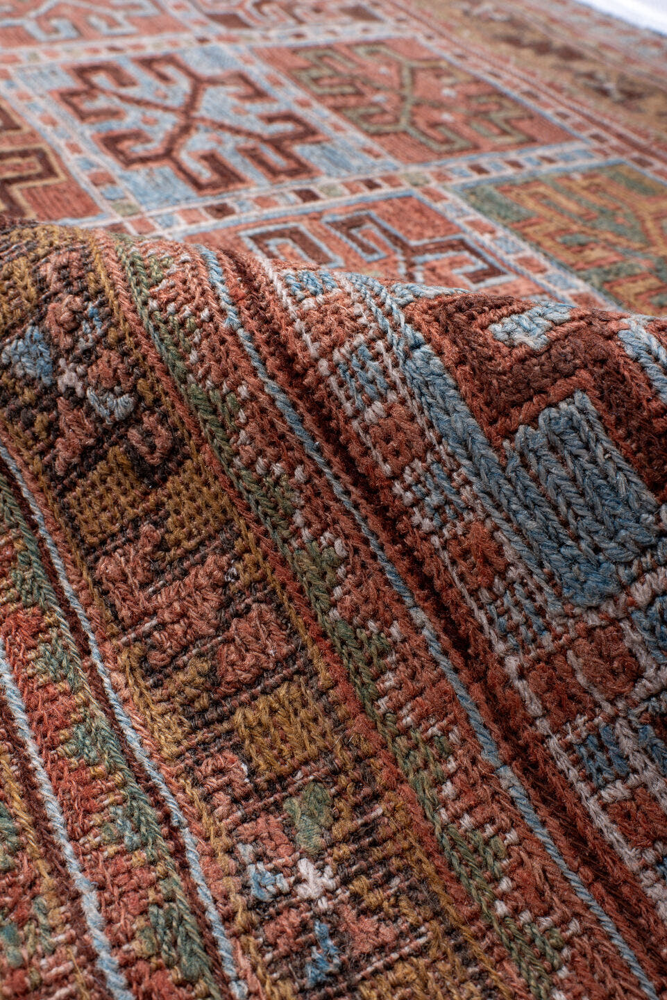 2' x 4' one-of-a-kind handmade antique Sumak small size rug. Color palette: rust, camel, sky blue, ivory, olive, brown