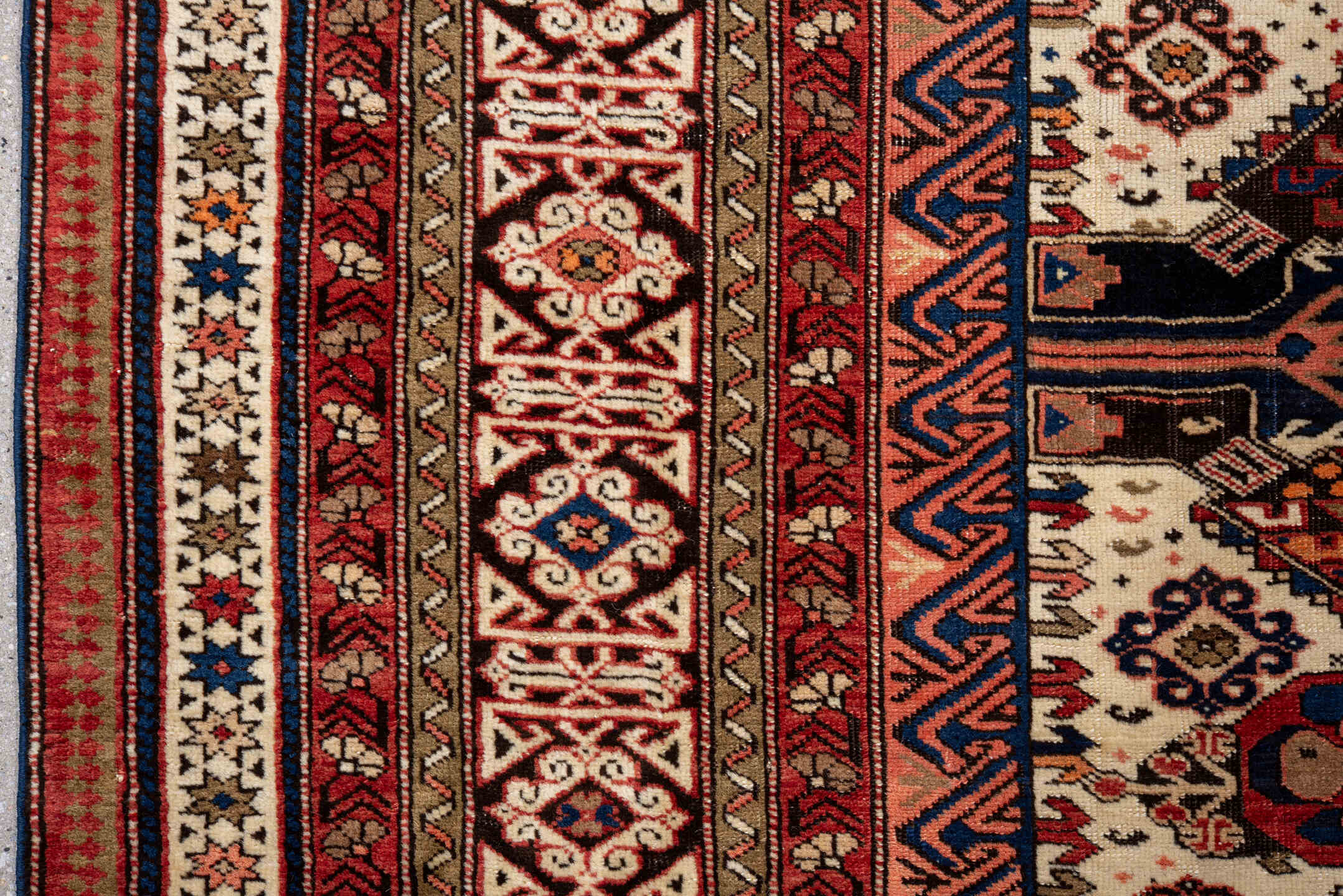 5' x 9' one-of-a-kind handmade vintage Caucasian medium size rug. Color palette: blue, brown, gray, light gray, off-white