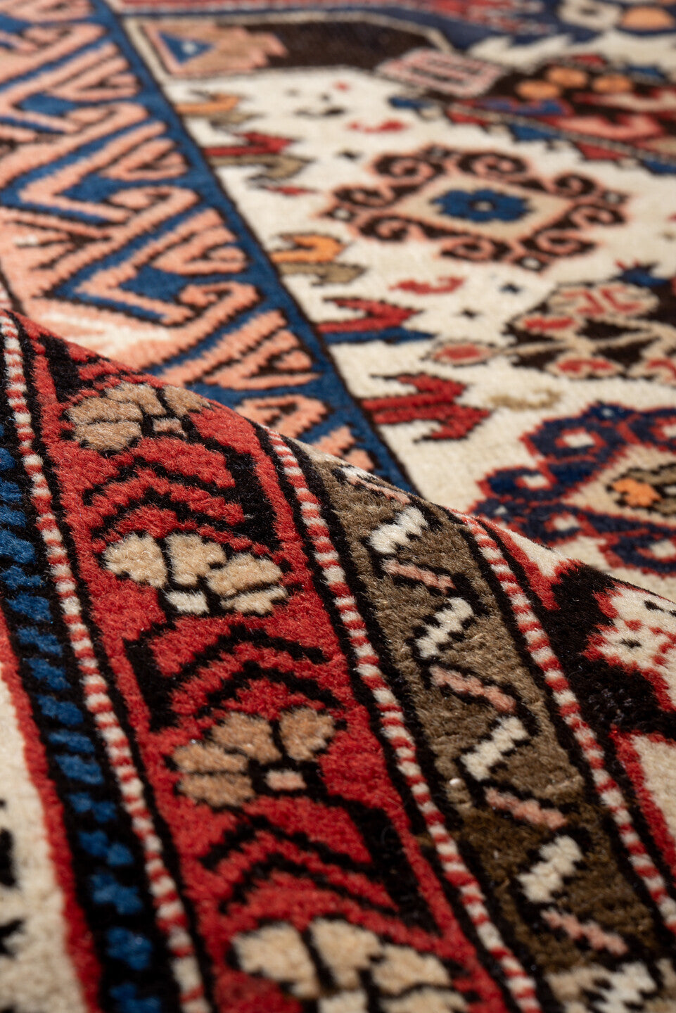 5' x 9' one-of-a-kind handmade vintage Caucasian medium size rug. Color palette: blue, brown, gray, light gray, off-white