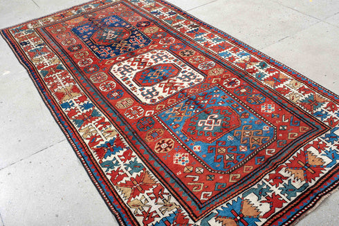 Antique Kazak Area Rug (5' x 10')