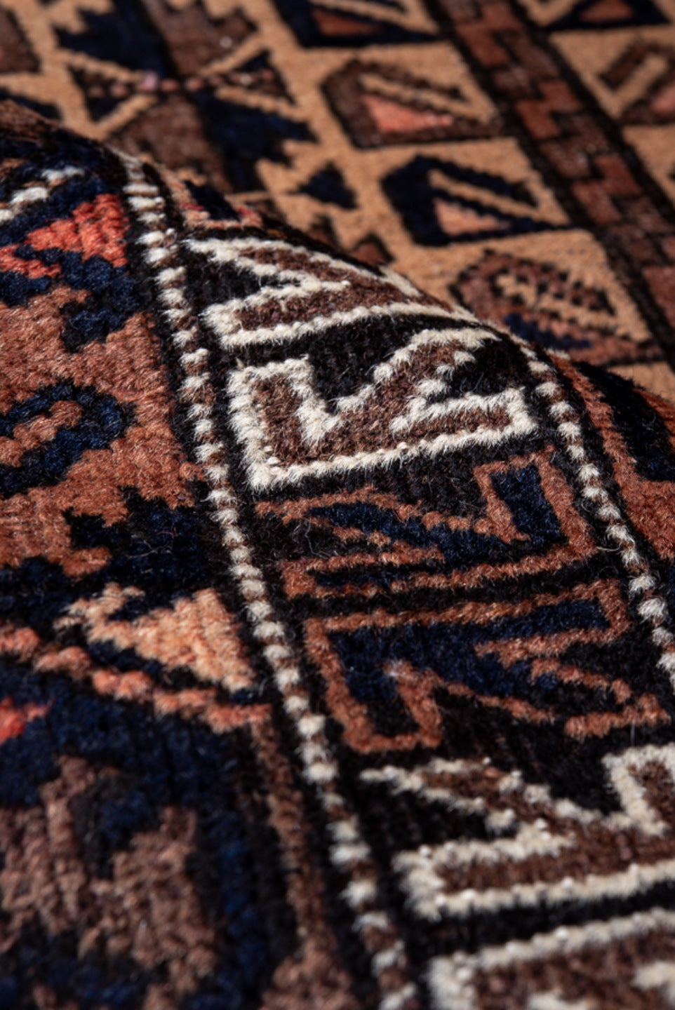 3' x 4' one-of-a-kind handmade antique Belouch small size rug. Color palette: brown, camel, rust, ivory, charcoal, rose