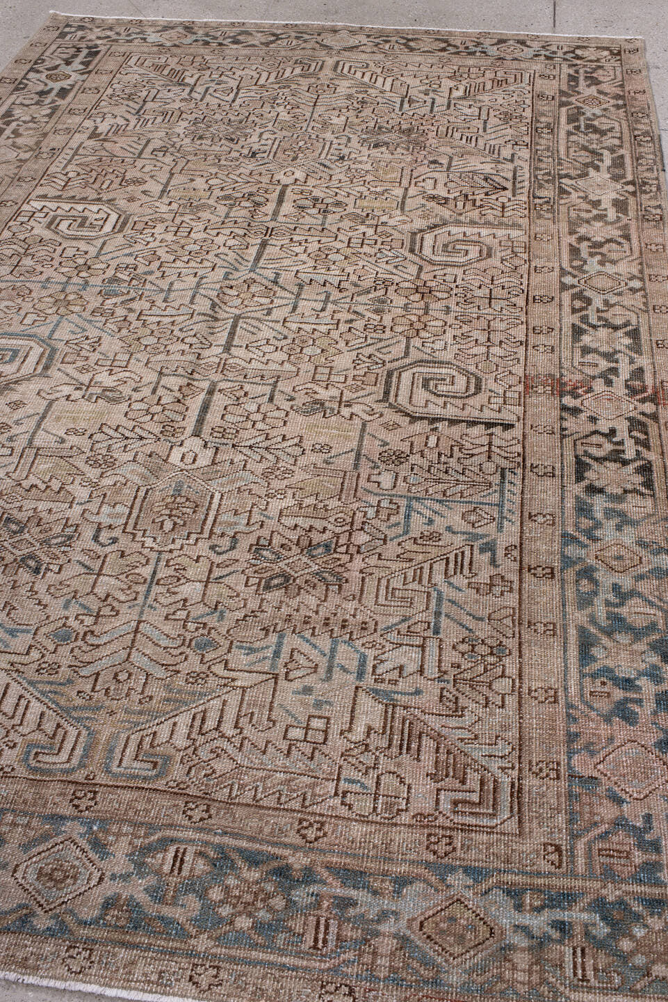 6' x 9' one-of-a-kind handmade antique Heriz medium size rug. Color palette: ivory, taupe, slate, charcoal, camel