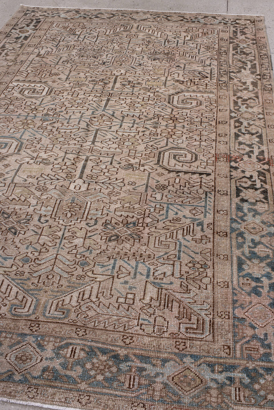 6' x 9' one-of-a-kind handmade antique Heriz medium size rug. Color palette: ivory, taupe, slate, charcoal, camel